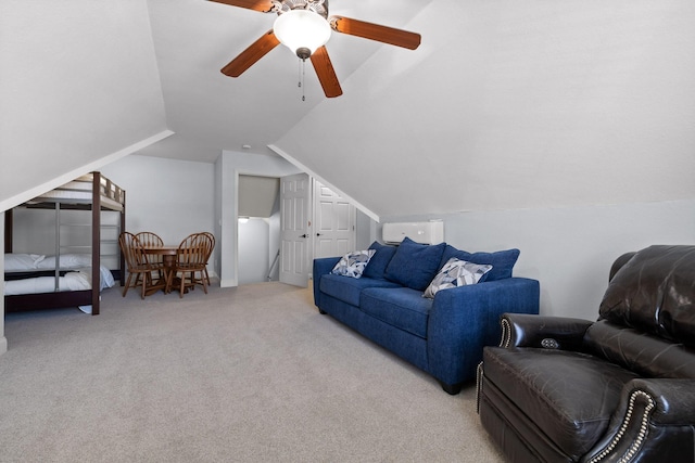 interior space featuring lofted ceiling and ceiling fan