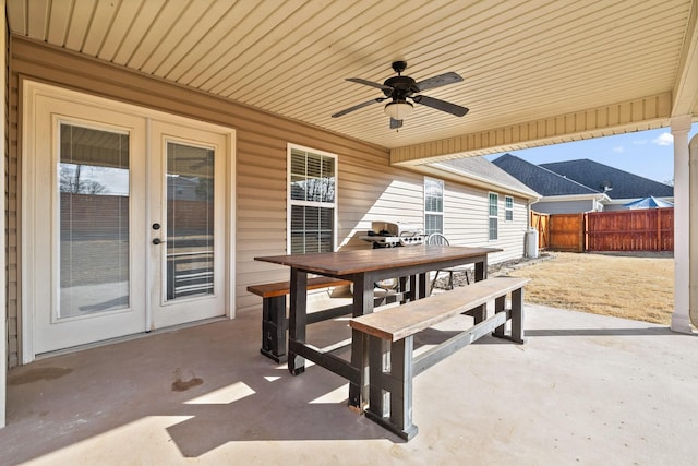 view of patio featuring ceiling fan and french doors