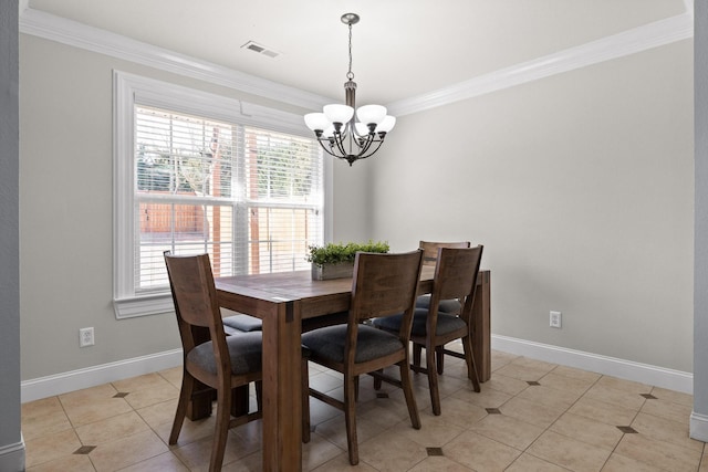 dining space with a notable chandelier, ornamental molding, and light tile patterned flooring