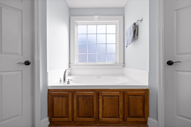 bathroom with a washtub