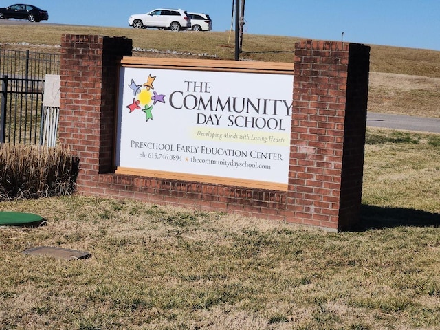 view of community sign