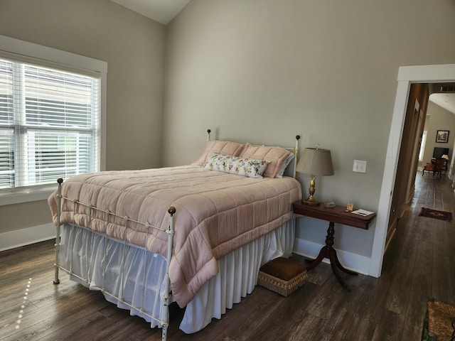 bedroom featuring dark hardwood / wood-style floors