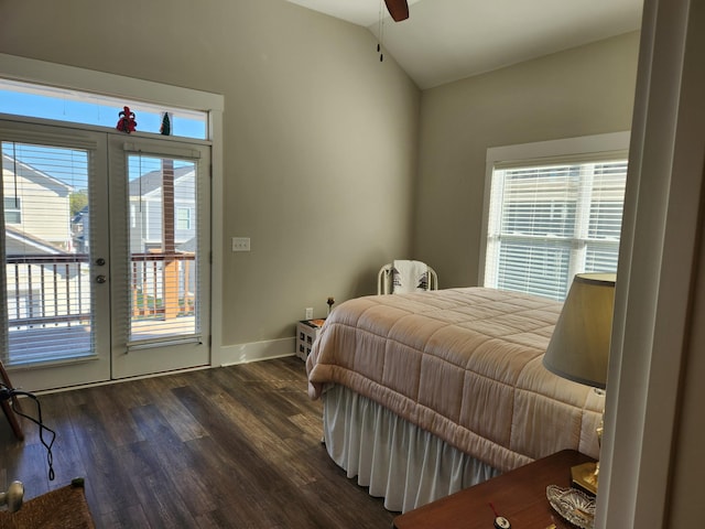 bedroom featuring lofted ceiling, ceiling fan, dark hardwood / wood-style floors, access to outside, and french doors