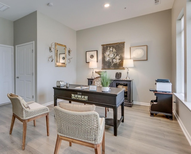 office area with light wood-type flooring