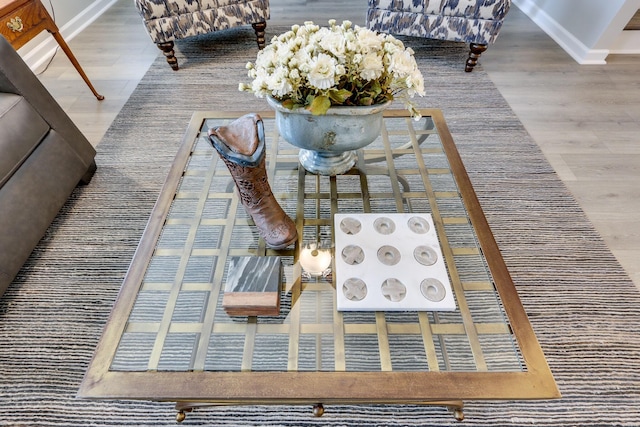 details featuring wood-type flooring