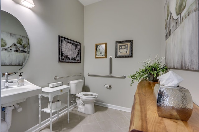 bathroom featuring tile patterned floors and toilet