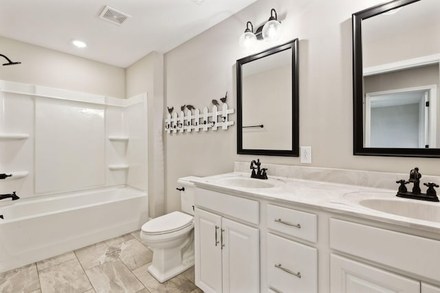 full bathroom with toilet, vanity, and bathtub / shower combination