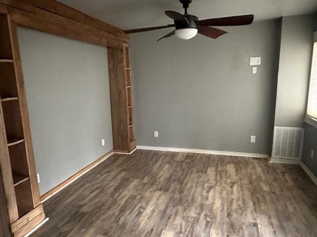 275 Patricia Cir, Indian Mound, TN 37079 - spare room with dark hardwood / wood-style floors and ceiling fan