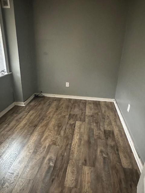 275 Patricia Cir, Indian Mound, TN 37079 - unfurnished room featuring dark hardwood / wood-style flooring