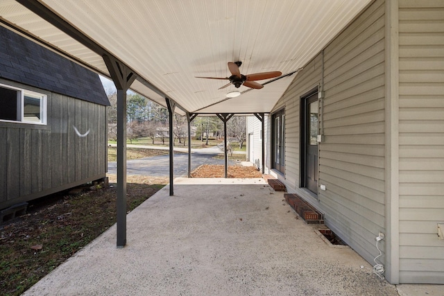 view of patio featuring ceiling fan