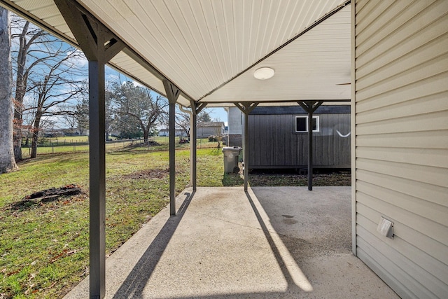 view of patio with a shed