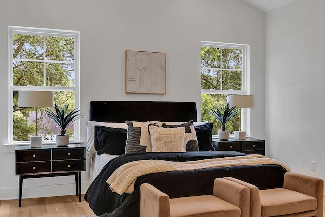 bedroom featuring light wood-type flooring