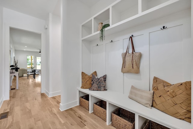 mudroom featuring wood-type flooring