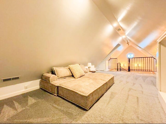 carpeted bedroom featuring lofted ceiling