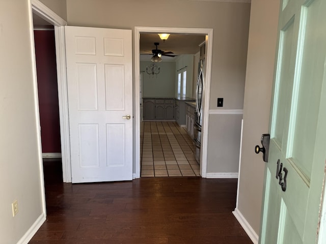 hallway featuring dark wood-type flooring