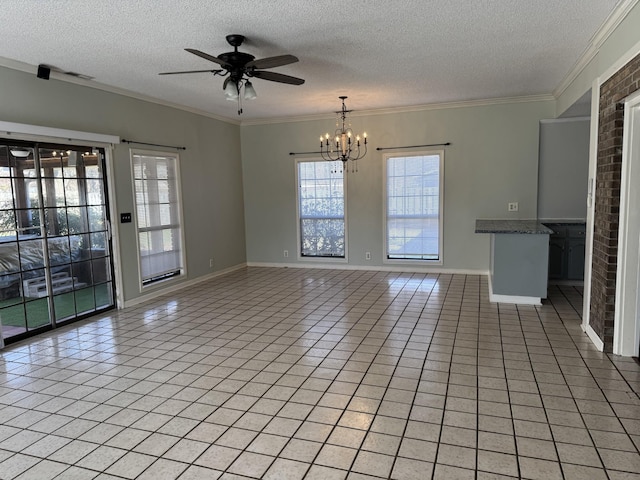tiled spare room featuring ornamental molding, ceiling fan with notable chandelier, and a textured ceiling