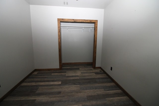 hallway featuring dark hardwood / wood-style floors