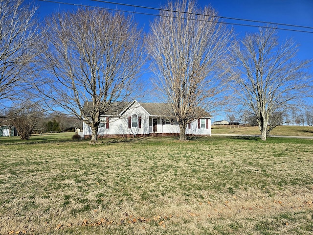 single story home with a front lawn