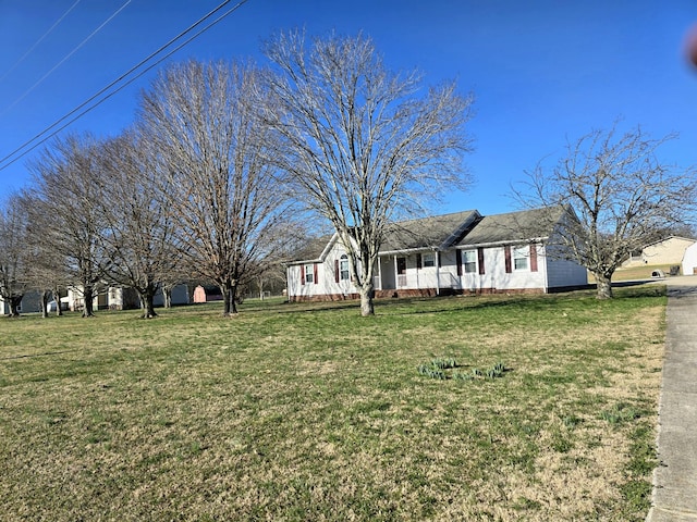 single story home with a front yard