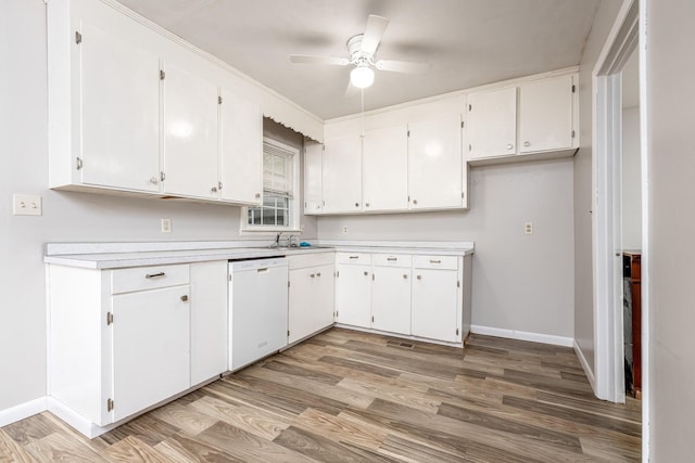 kitchen with dishwasher, wood-type flooring, sink, white cabinets, and ceiling fan