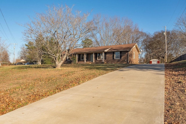 ranch-style house with a front yard