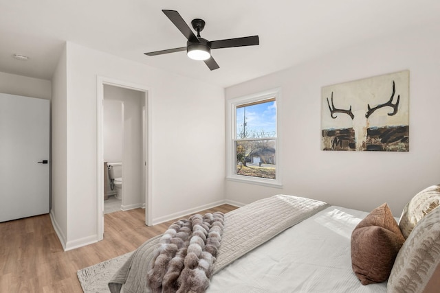 bedroom with light hardwood / wood-style flooring and ceiling fan