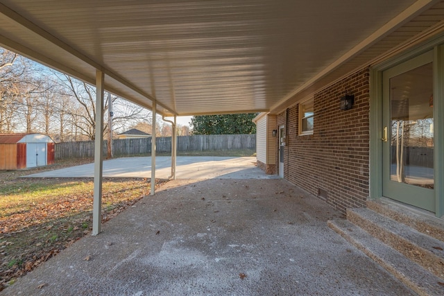 view of patio / terrace with a storage shed