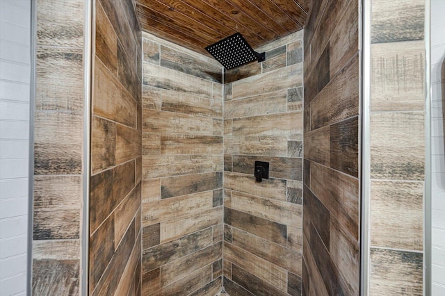 bathroom with a tile shower