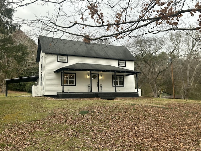 view of front of property featuring covered porch, a chimney, and a front lawn