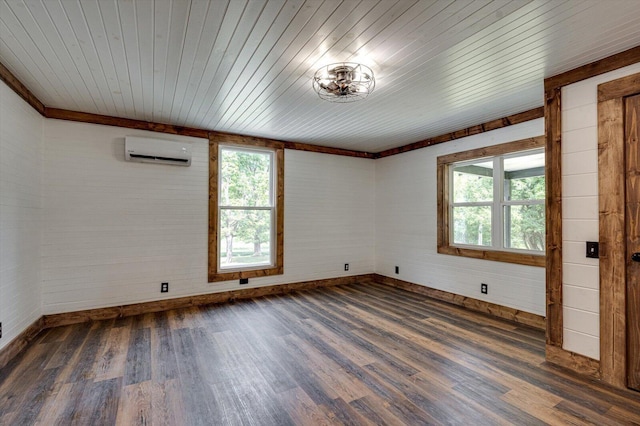 empty room featuring an AC wall unit, dark wood-type flooring, and wood ceiling