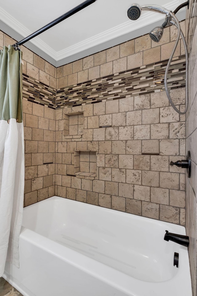 bathroom featuring ornamental molding and shower / bath combo with shower curtain