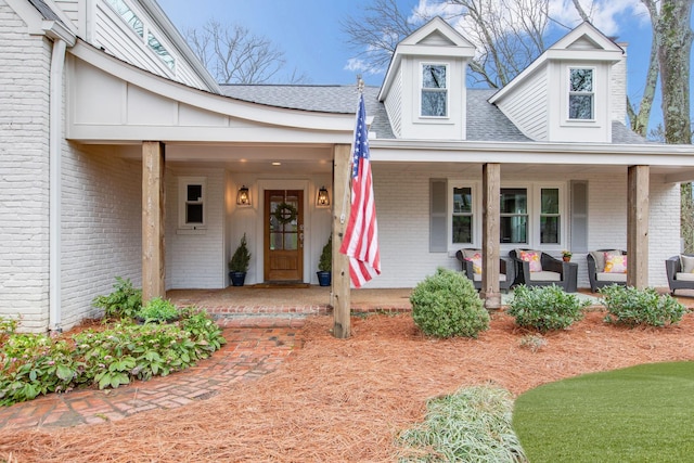 doorway to property with covered porch