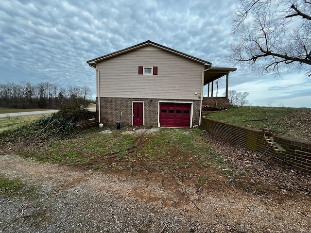 exterior space featuring a garage