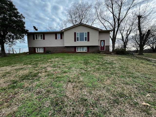 bi-level home with a front yard