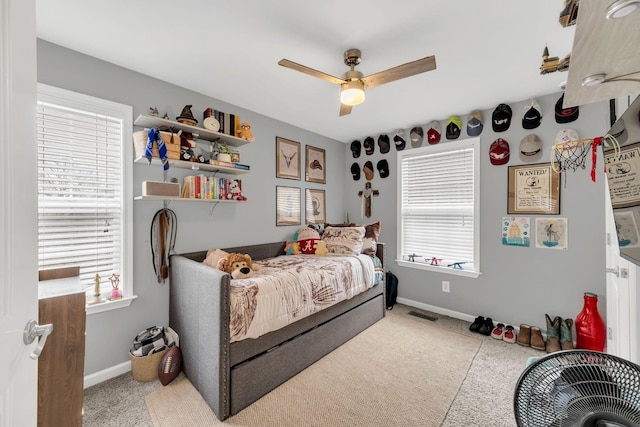 carpeted bedroom featuring ceiling fan