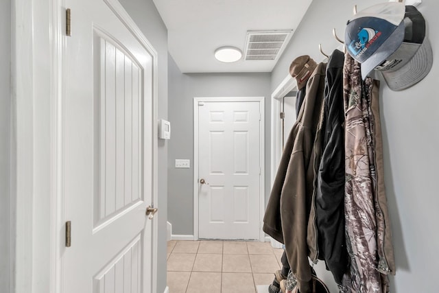 mudroom featuring light tile patterned flooring