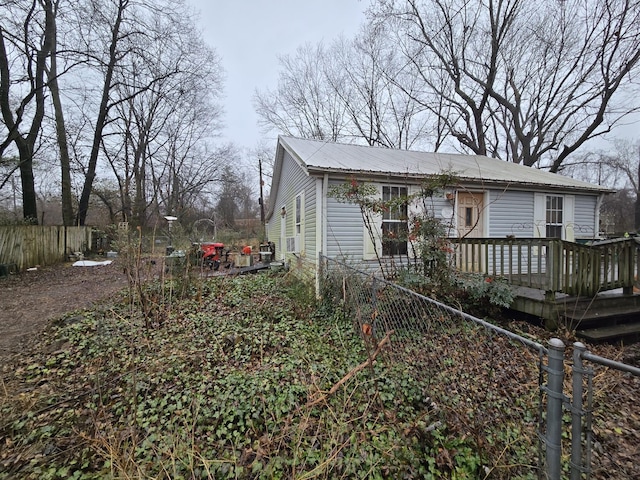 view of front of house with a wooden deck