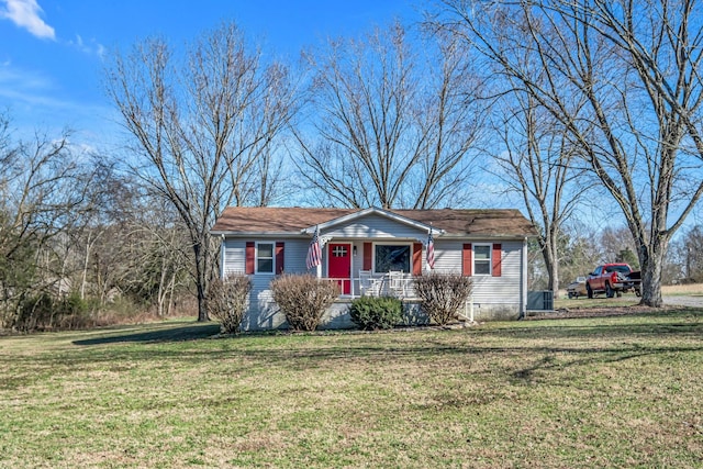 view of front of property with a front yard and a porch