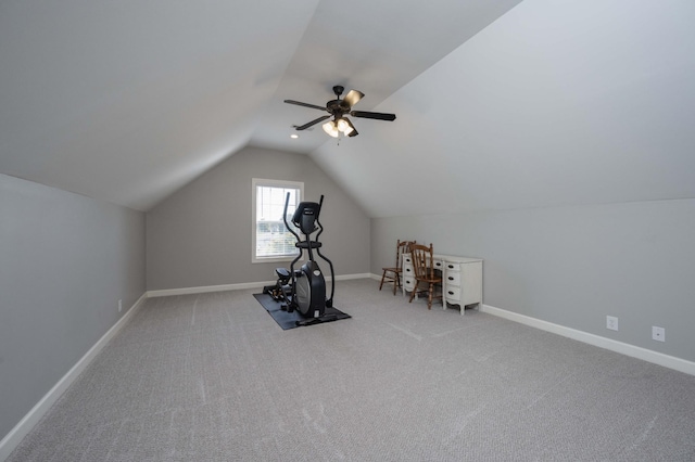 workout area featuring lofted ceiling, carpet floors, and ceiling fan