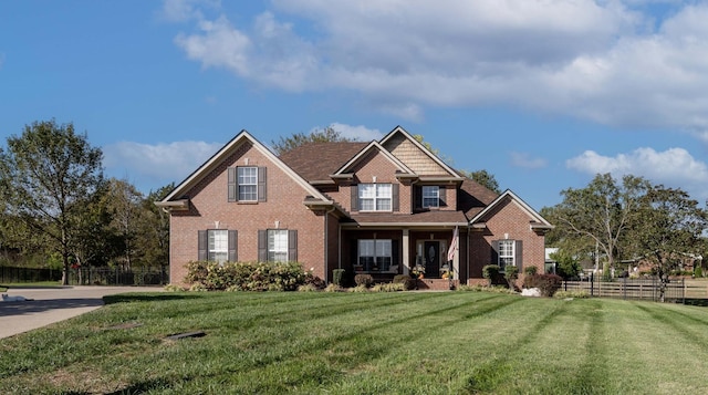 craftsman-style home with a porch and a front lawn