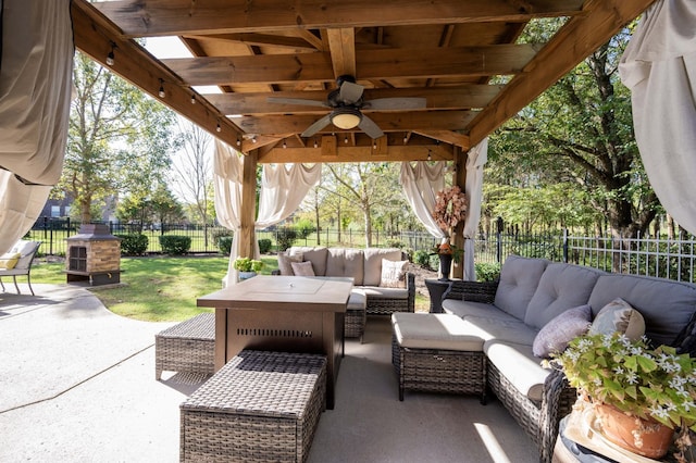 view of patio featuring an outdoor living space and ceiling fan