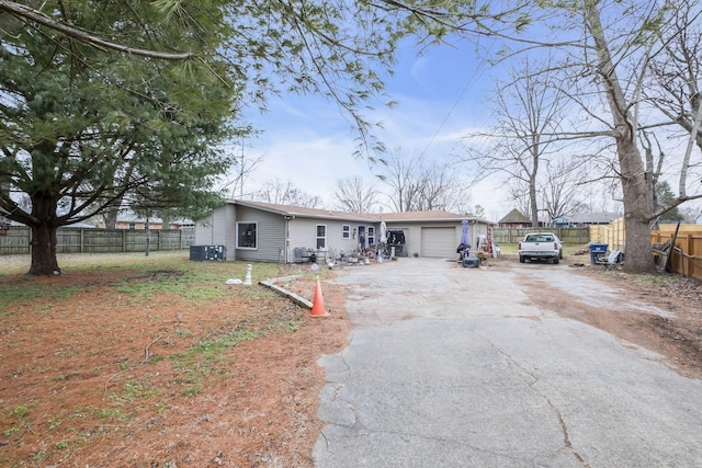 single story home featuring a garage