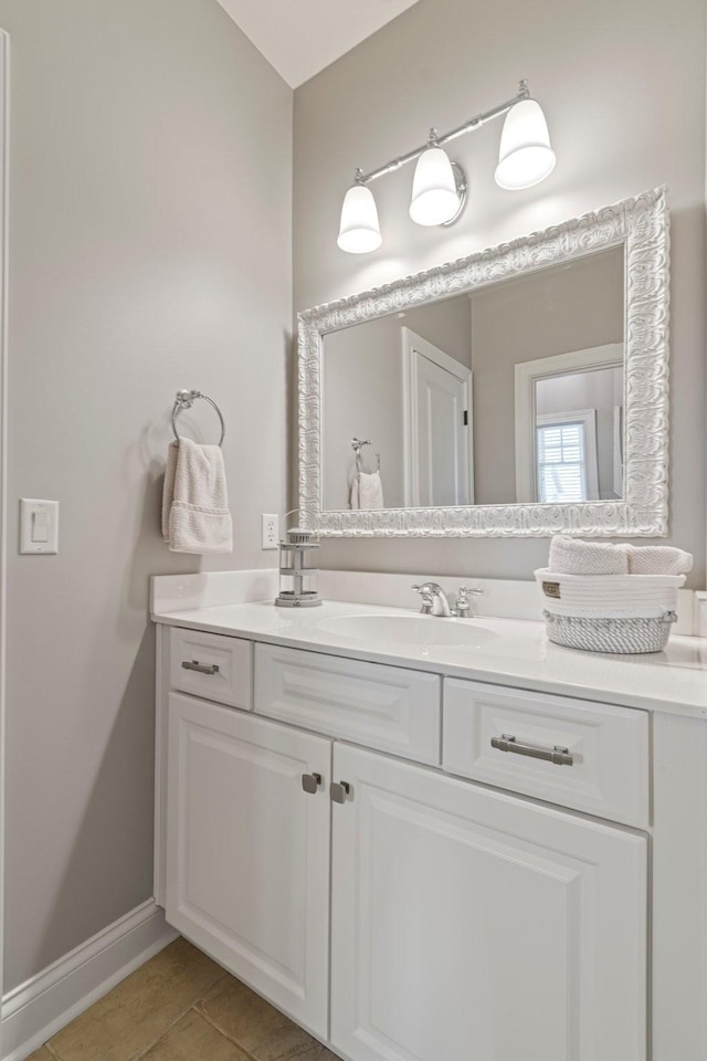 bathroom with vanity and tile patterned flooring