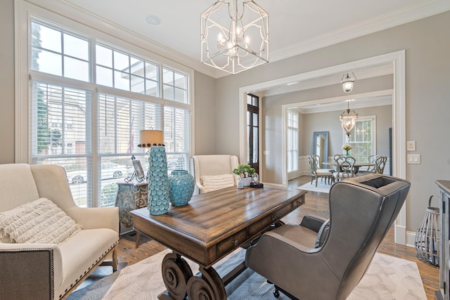 office area featuring crown molding, hardwood / wood-style floors, and an inviting chandelier