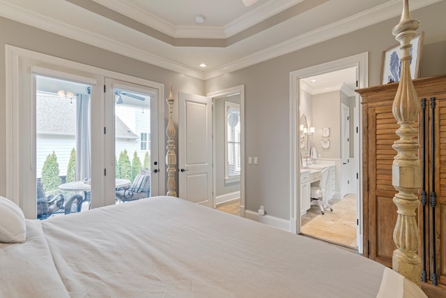 bedroom featuring ornamental molding, access to exterior, and connected bathroom