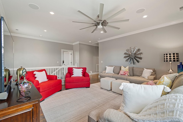 living room featuring crown molding, ceiling fan, and light wood-type flooring