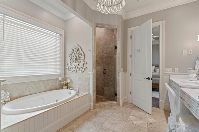 bathroom featuring crown molding, vanity, separate shower and tub, and an inviting chandelier