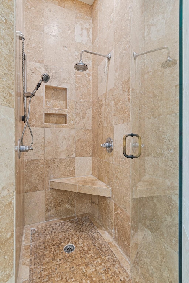 bathroom featuring an enclosed shower