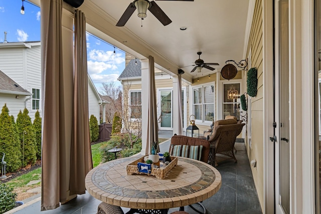 view of patio with ceiling fan