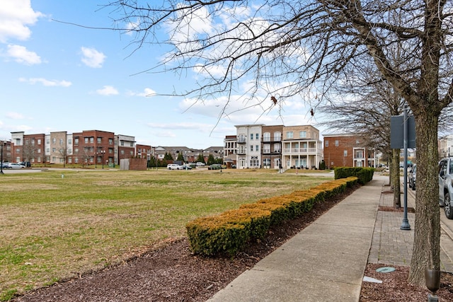 view of home's community featuring a yard